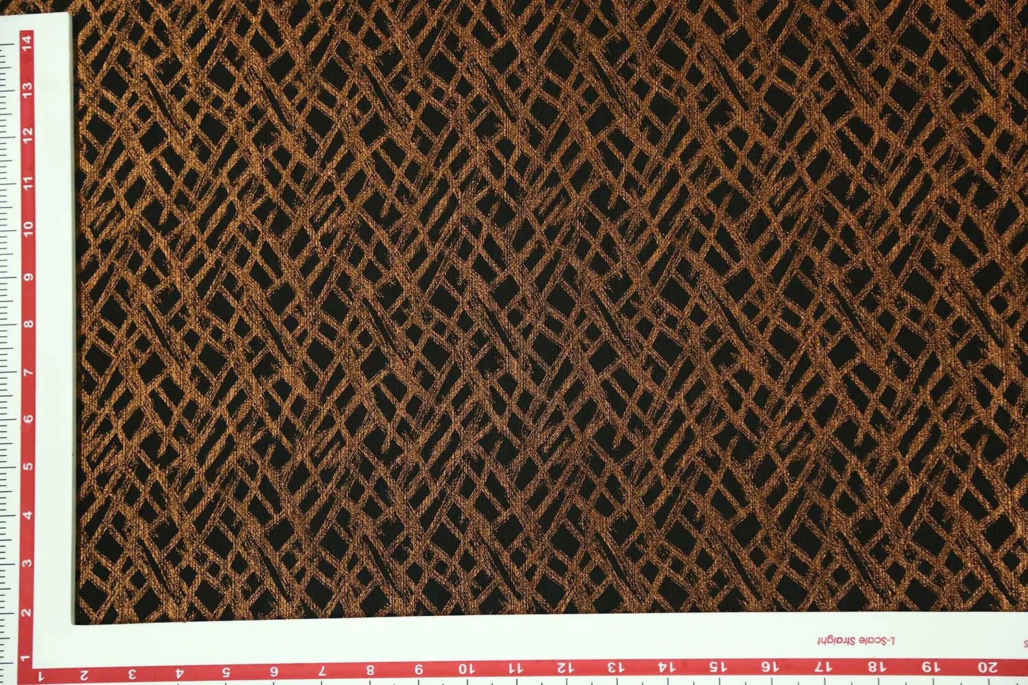 Bronze on Black Base Foil Printed Knit Fabric