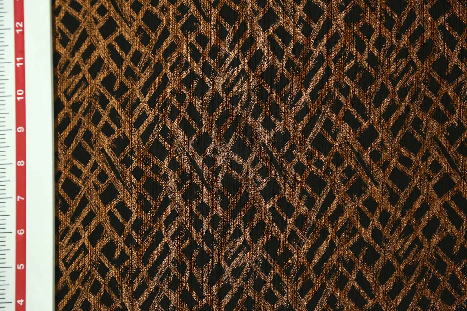 Bronze on Black Base Foil Printed Knit Fabric